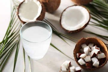 Glass of coconut water on table