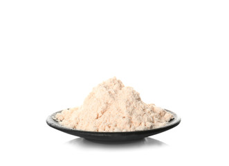 Fototapeta na wymiar Plate with heap of coconut flour on white background