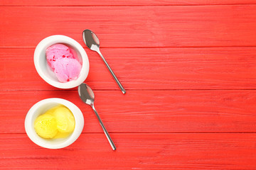 Ice cream collection in bowls on wooden background