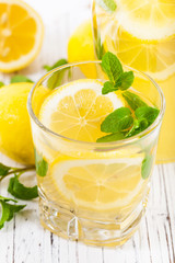 Lemonade Drink with Lemon Juice. Selective and Soft focus.