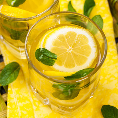 Lemonade Drink with Lemon Juice. Selective and Soft focus.