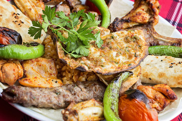 mixed kebab served on plate