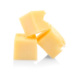 Pieces of delicious cheese on white background