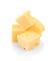 Pieces of delicious cheese on white background