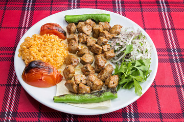 Shish kebab served on the table