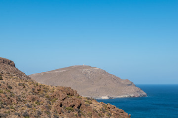 mountains by the sea coastline