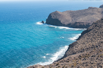 mountains by the sea coastline