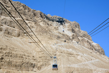 Cable to Masada complex, Dead Sea coast, Israel. Masada is an ancient fortress that had been built by King Herod the Great and destroyed by Romans.