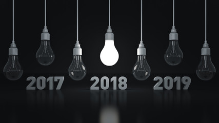 2018 New Year sign inside light bulbs. 3D rendering