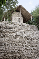 Fototapeta na wymiar ancient stone structure at Coba Mayan Ruins, Mexico