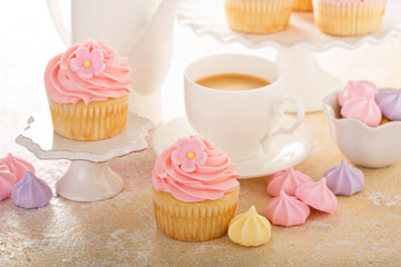 Vanilla cupcakes with pink raspberry frosting