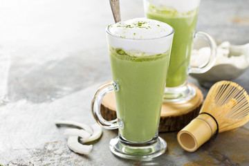 Matcha coconut latte in tall glasses
