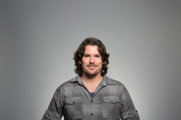 Studio portrait of a confident man