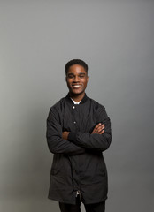 Studio portrait of an excited young man