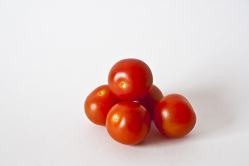 Cherry tomatoes on a white background, fresh tomatoes