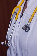 Phonendoscope on the neck of a doctor, medical instruments