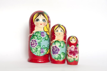 Nested doll on white background, colorful developing wooden toys for children