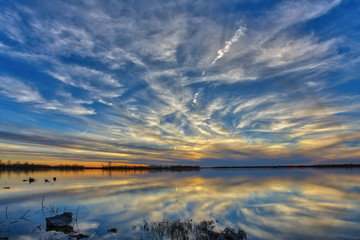 A sunset over Horseshoe Lake State Park in Pnotoon Beach, Illinois.