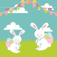 rabbits and easter eggs over blue background. colorful design. vector illustration