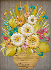 handmade applique from painted straw