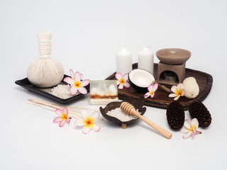 Aromatherapy  product  Spa set ,candle ,soap,coconut,flower,shell,  massage  with wood    background .