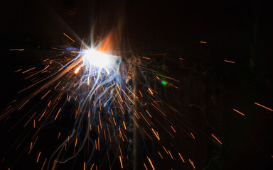 SMAW – Shielded metal arc welding and welding fumes closeup.