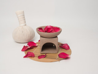 Aromatherapy  product  Spa massage set  hold by hand   with white background .