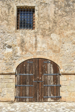 Old wooden gates and window  in Rethymnon. Greece
