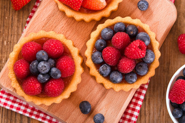 Tartlets with forest fruits.