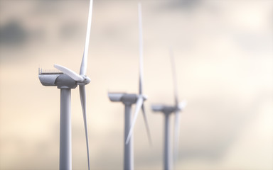 Eine Gruppe Windräder vor wolkigem Himmel