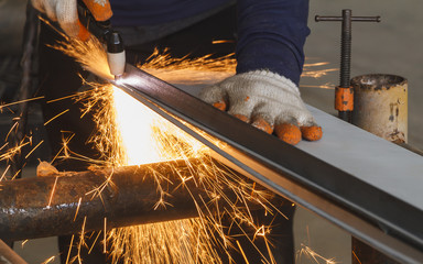 Manual Plasma Cutting Machine on Steel for Structure Fabrication Work. - obrazy, fototapety, plakaty