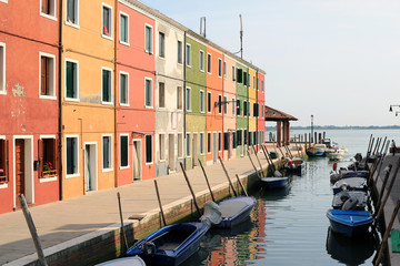 promenade of colorful houses in Burano, Venice Italy