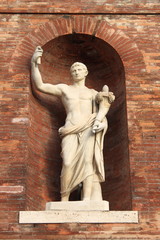 Fototapeta premium Ancient roman statue with cornucopia in Rome, Italy