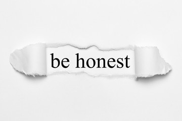 be honest on white torn paper