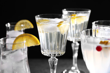 Different refreshing cocktails on table
