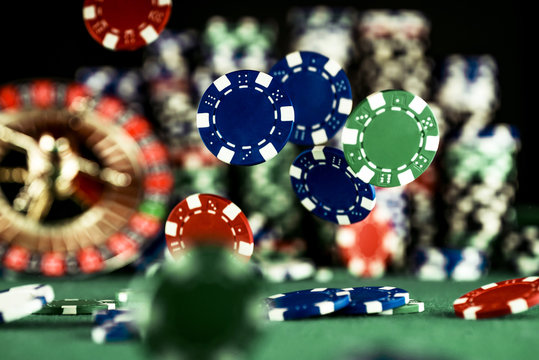 Casino Concept background with dice, roulette and chips. in montion
