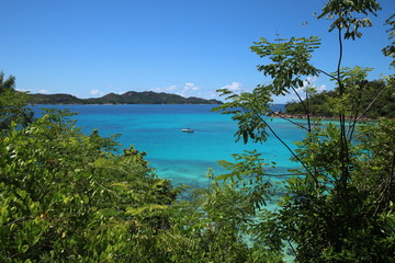 Fototapeta na wymiar View to Anse Petite Cour and Curieuse Island which are situated in the north of Praslin Island, Seychelles, Indian Ocean, Africa