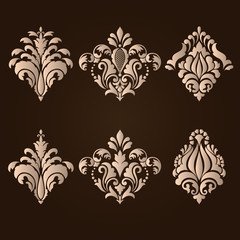 Vector set of damask ornamental elements. Elegant floral abstract elements for design. Perfect for invitations, cards etc.