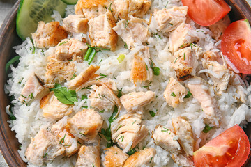 Delicious rice with chicken and vegetables, closeup