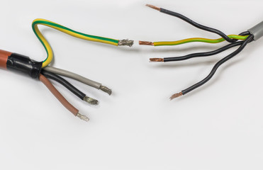 closeup of wire electric cable on a white background,A jumble of multi colored wires
