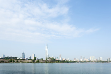 Obraz premium cityscape of nanjing near river in blue sky