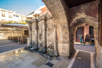 The Rimondi Fountain in the centre of the old town of Rethymnon, Crete, Greece - obrazy, fototapety, plakaty
