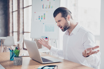 Portrait of angry businessman in bad mood showing again failed the task