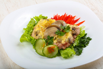Pork steak with mushroom and cheese