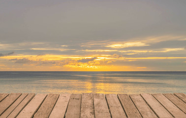 Wooden terrace with the beach view in summer