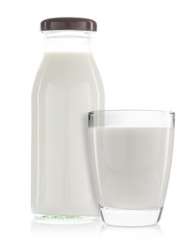 a cup of milk and bottle of milk isolated