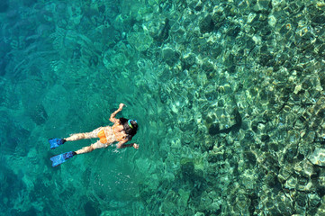 Sexy woman snorkeling