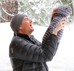 People: Father with newborn in snow