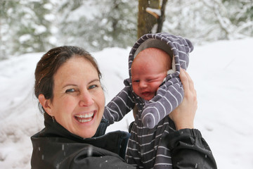 People: Mother with newborn in snow