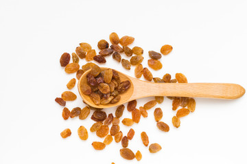Dried raisins on white background
